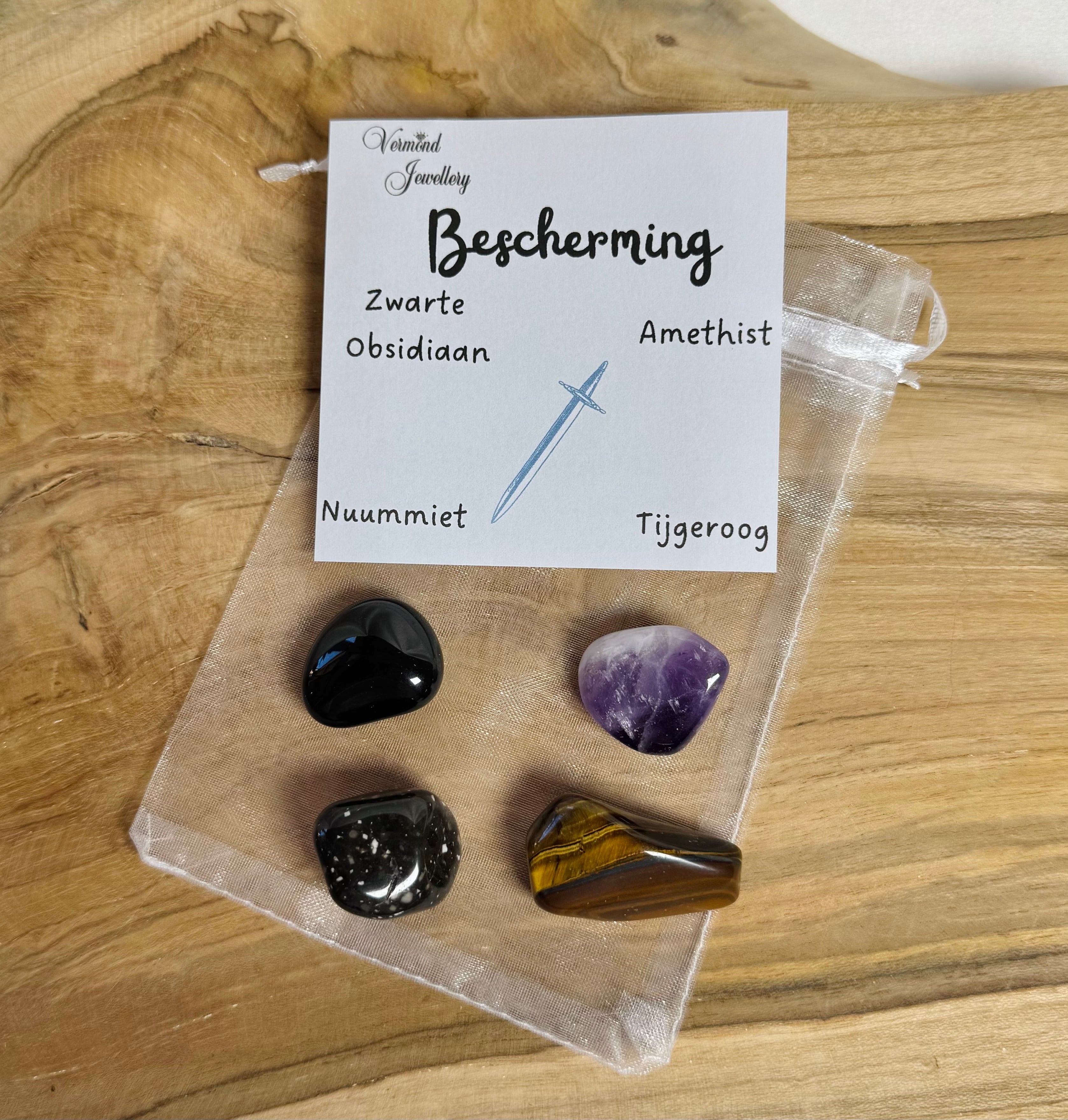 Bescherming trommelstenen zakje